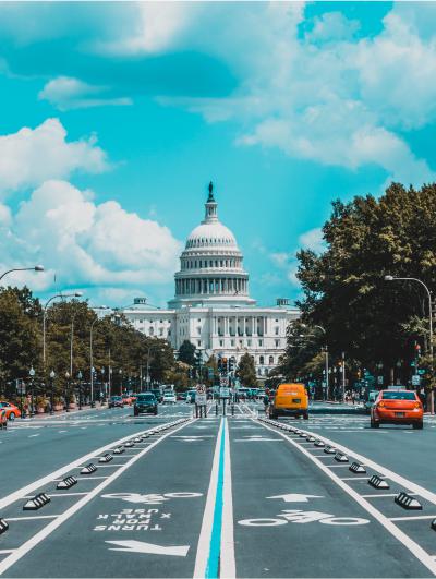 Capitol building with cars and bike lanes