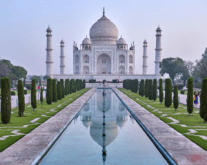 Taj Mahal reflected in serene water garden
