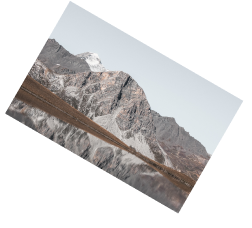 Majestic mountain reflected in calm water